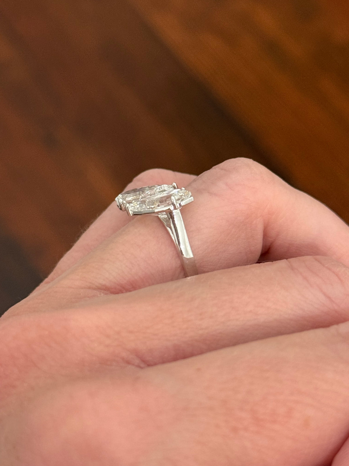 White gold 4.38ct step cut pear lab diamond bypass ring. Each measures 12.78x6.10mm