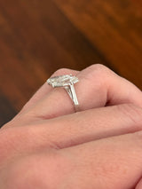 White gold 4.38ct step cut pear lab diamond bypass ring. Each measures 12.78x6.10mm