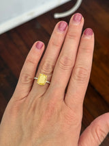Yellow gold elongated cushion cut yellow lab diamond and white lab diamond ring