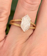 Yellow gold 2.6ct duchess cut lab diamond and round lab diamond ring. Duchess cut measures 13.3x6.59mm