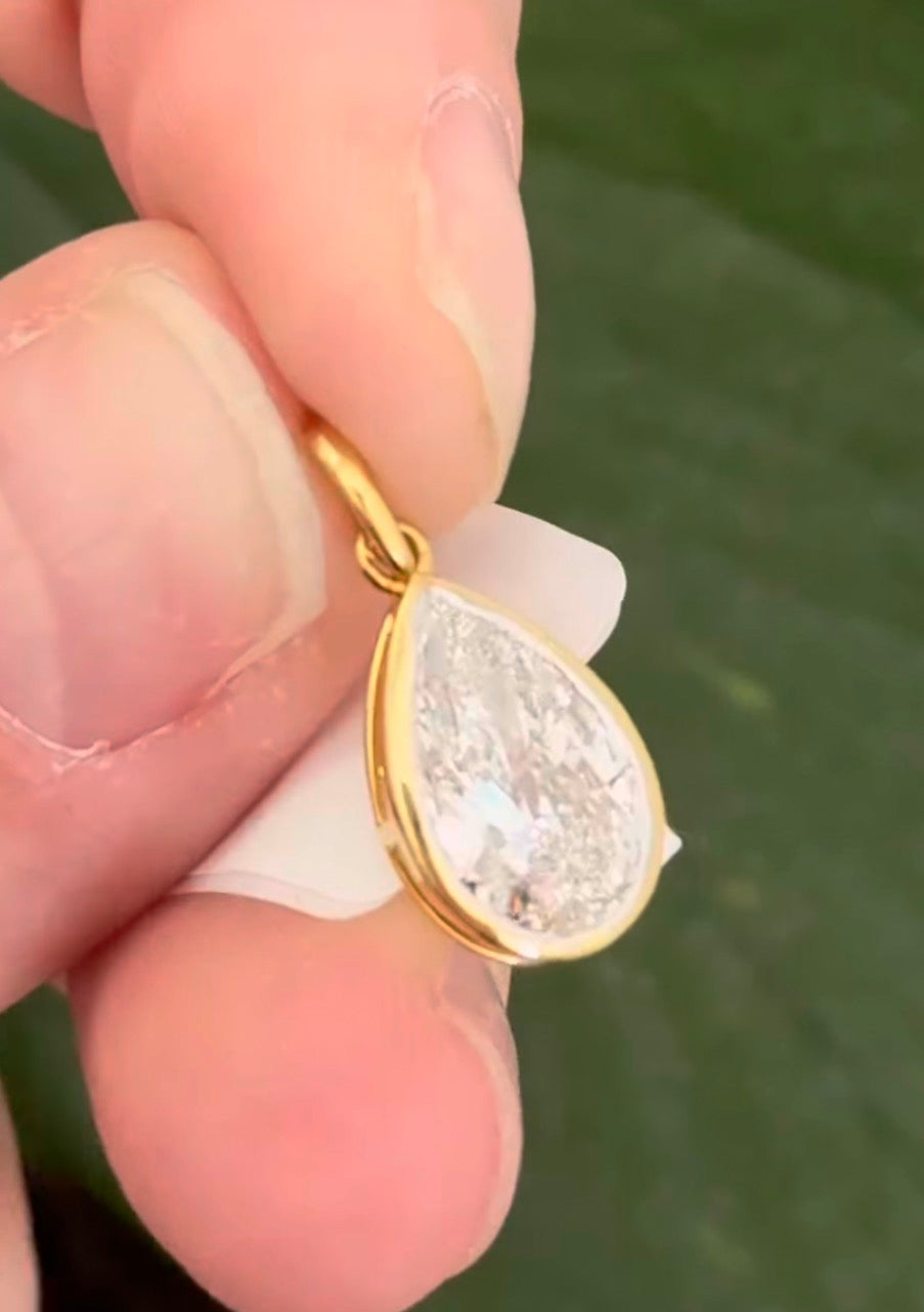 Yellow gold bezel set 2.01ct pear shaped lab diamond pendant