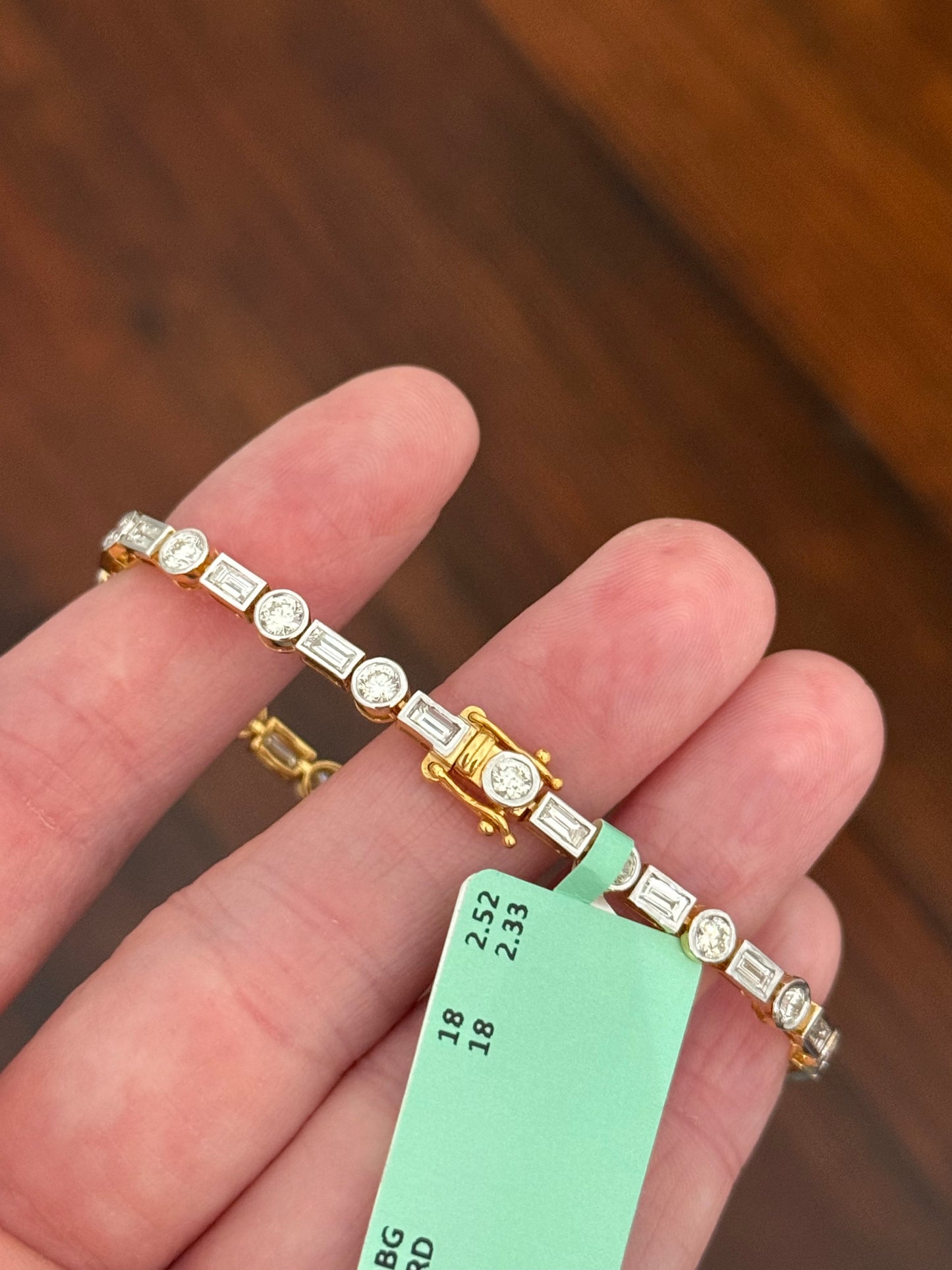 Yellow gold with white gold bezel setting 4.85ct baguette and round natural diamond bracelet