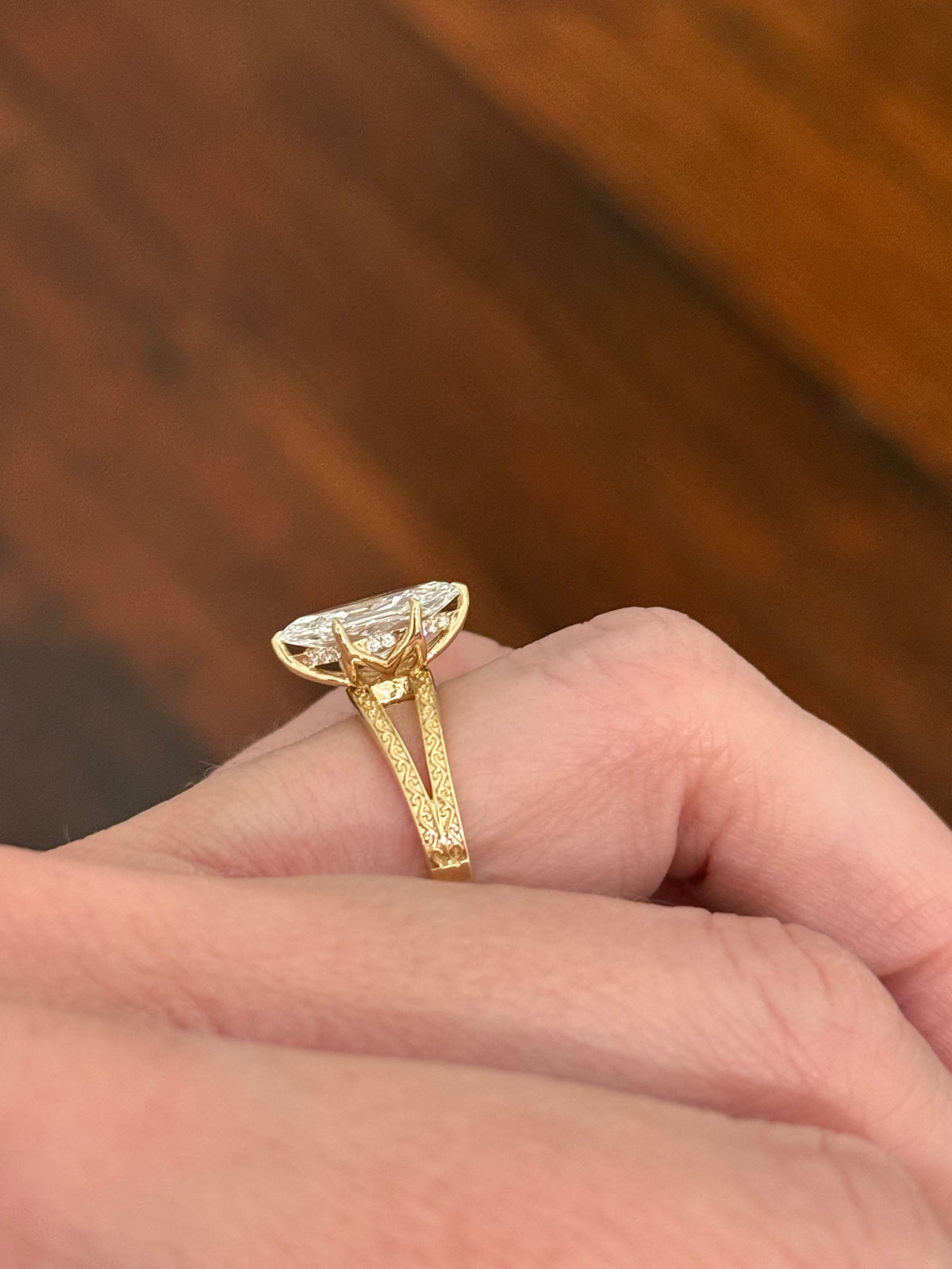 Yellow gold 2.6ct duchess cut lab diamond and round lab diamond ring. Duchess cut measures 13.3x6.59mm