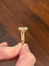Yellow gold 2.6ct duchess cut lab diamond and round lab diamond ring. Duchess cut measures 13.3x6.59mm