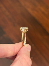 Yellow gold IGI certified emerald cut and tapered baguette lab diamond ring. Center stone is 3.03cts