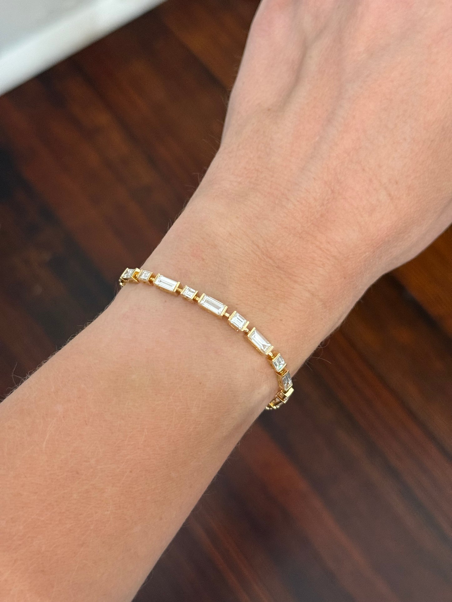 Yellow gold 7.22ct baguette and emerald cut natural diamond bracelet