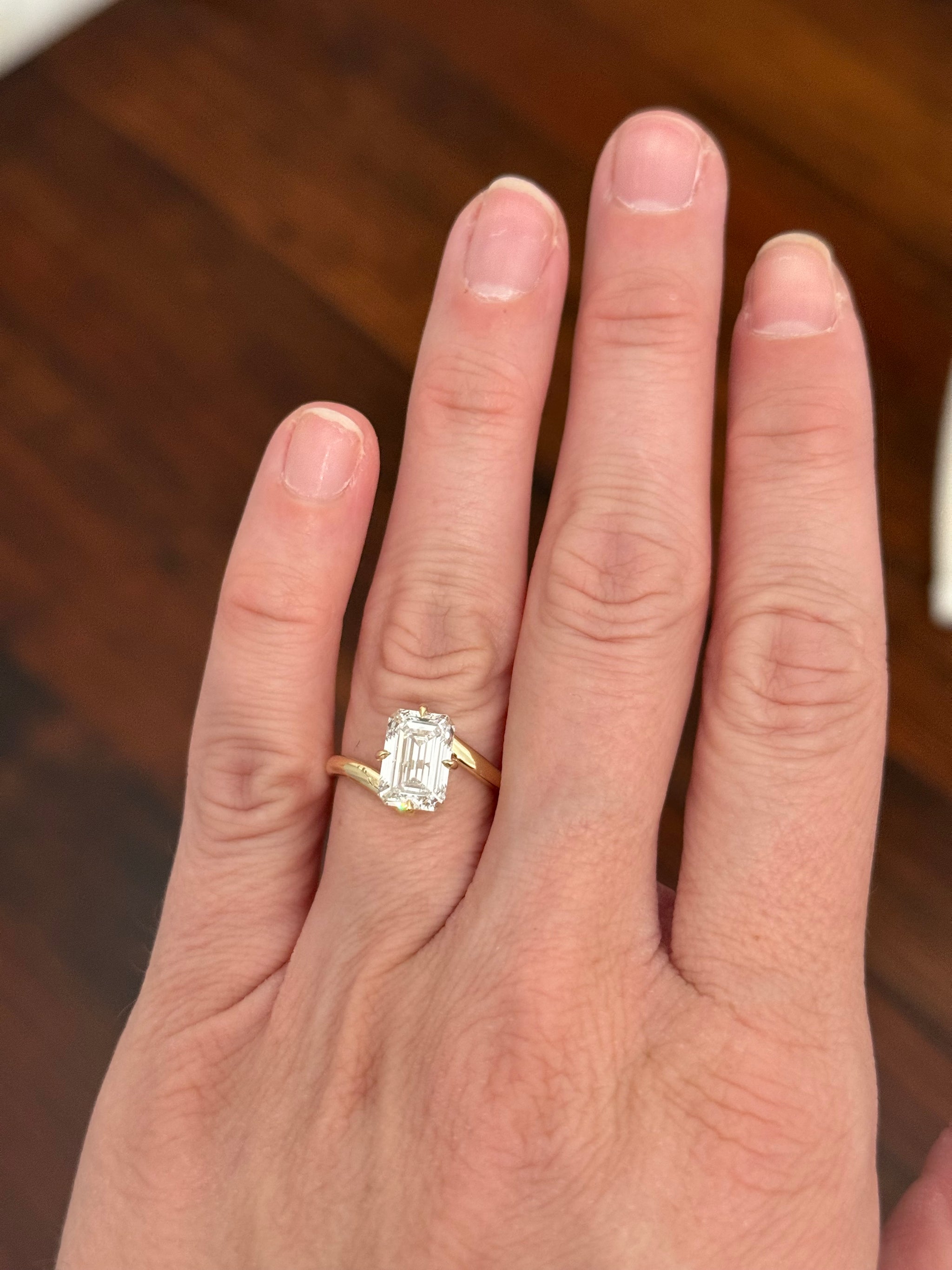 Yellow gold IGI certified 3.03ct emerald cut lab diamond ring