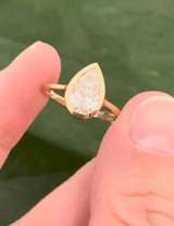 Yellow gold bezel set 1.96ct pear shaped lab diamond ring