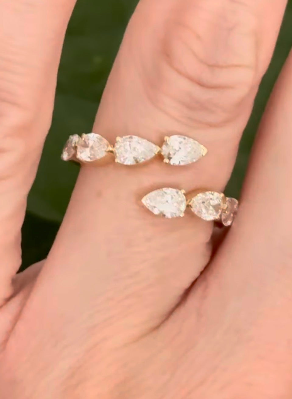 Yellow gold pear shape lab diamond bypass ring