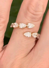 Yellow gold pear shape lab diamond bypass ring