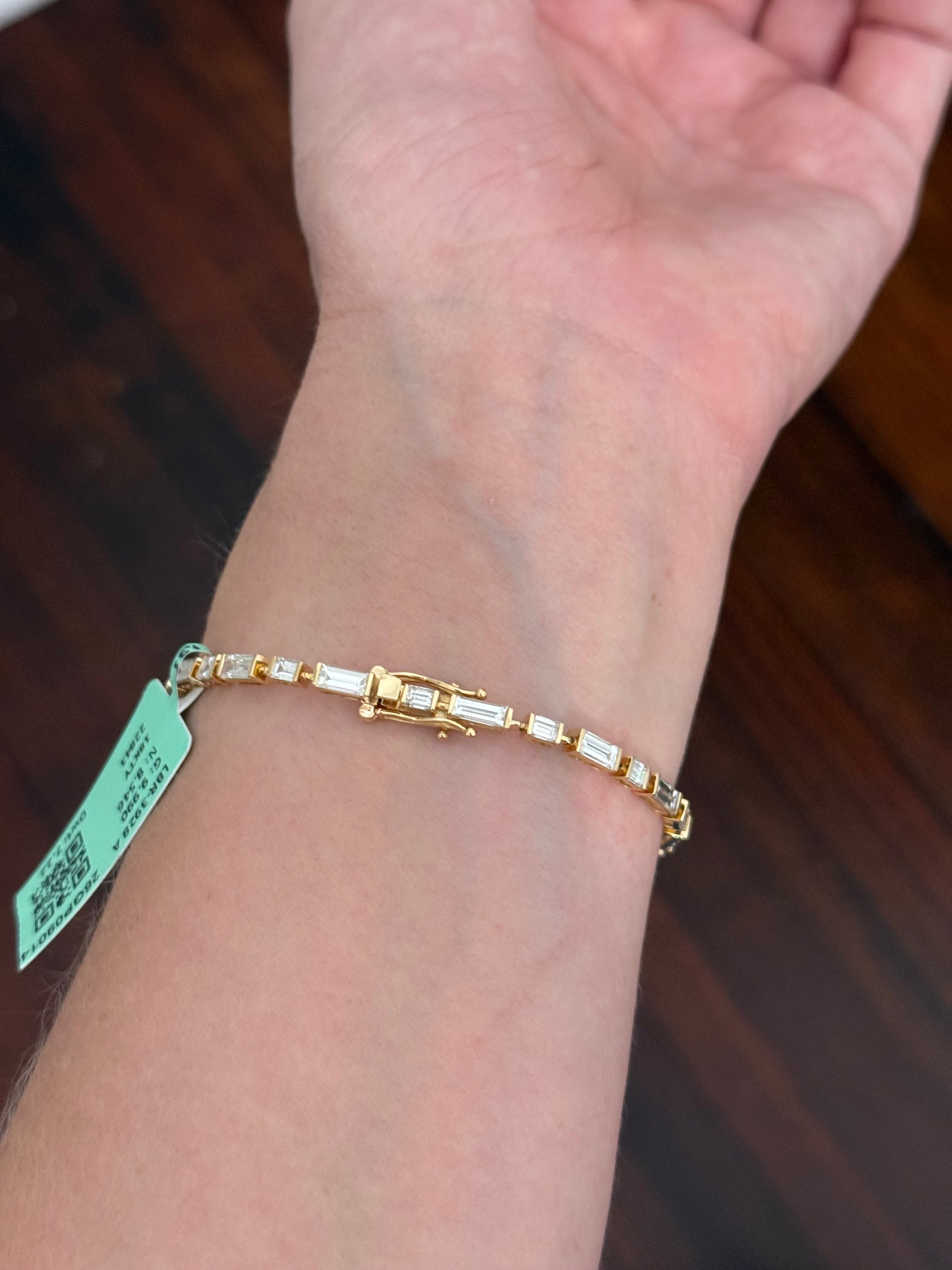 Yellow gold 7.22ct baguette and emerald cut natural diamond bracelet
