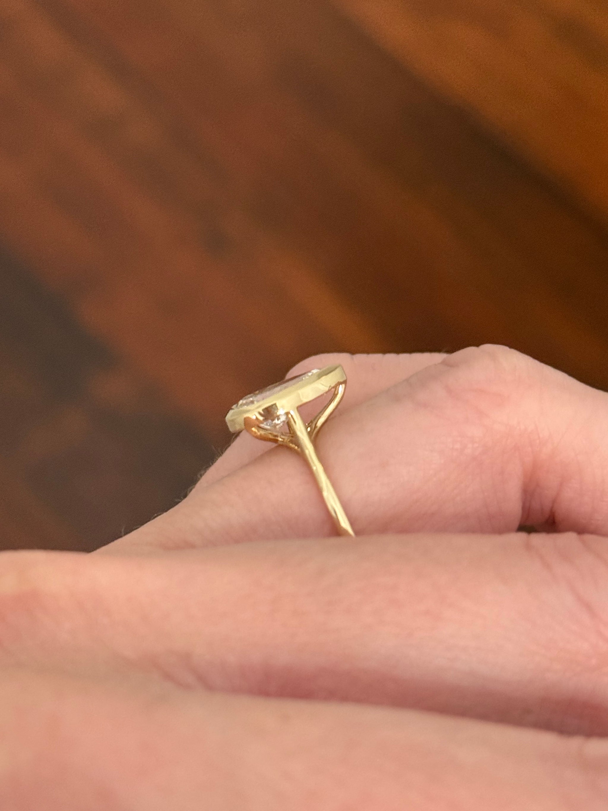 Yellow gold bezel set 1.96ct pear shaped lab diamond ring