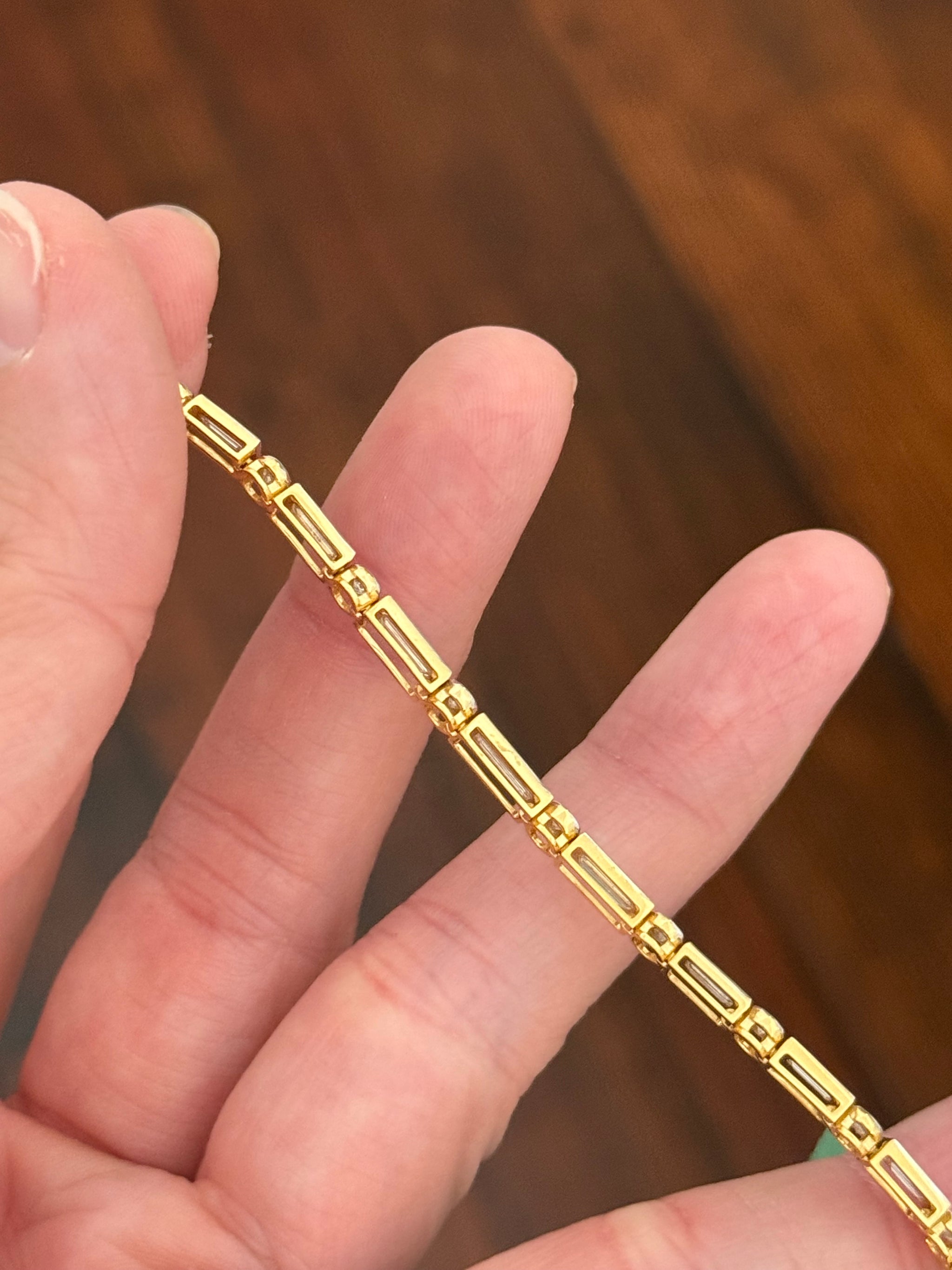 Yellow gold with white gold bezel setting 3.84ct baguette and round natural diamond bracelet