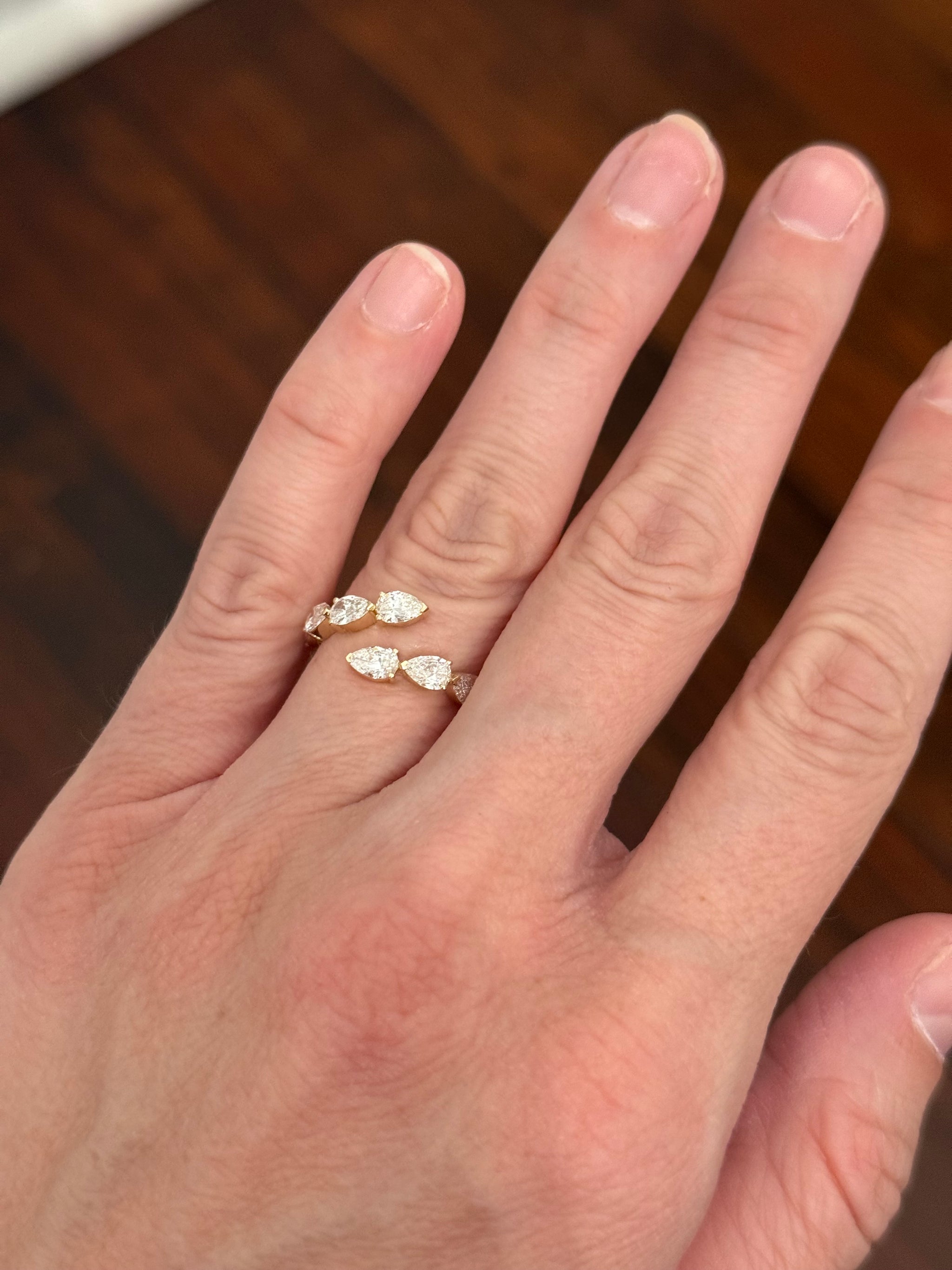 Yellow gold pear shape lab diamond bypass ring