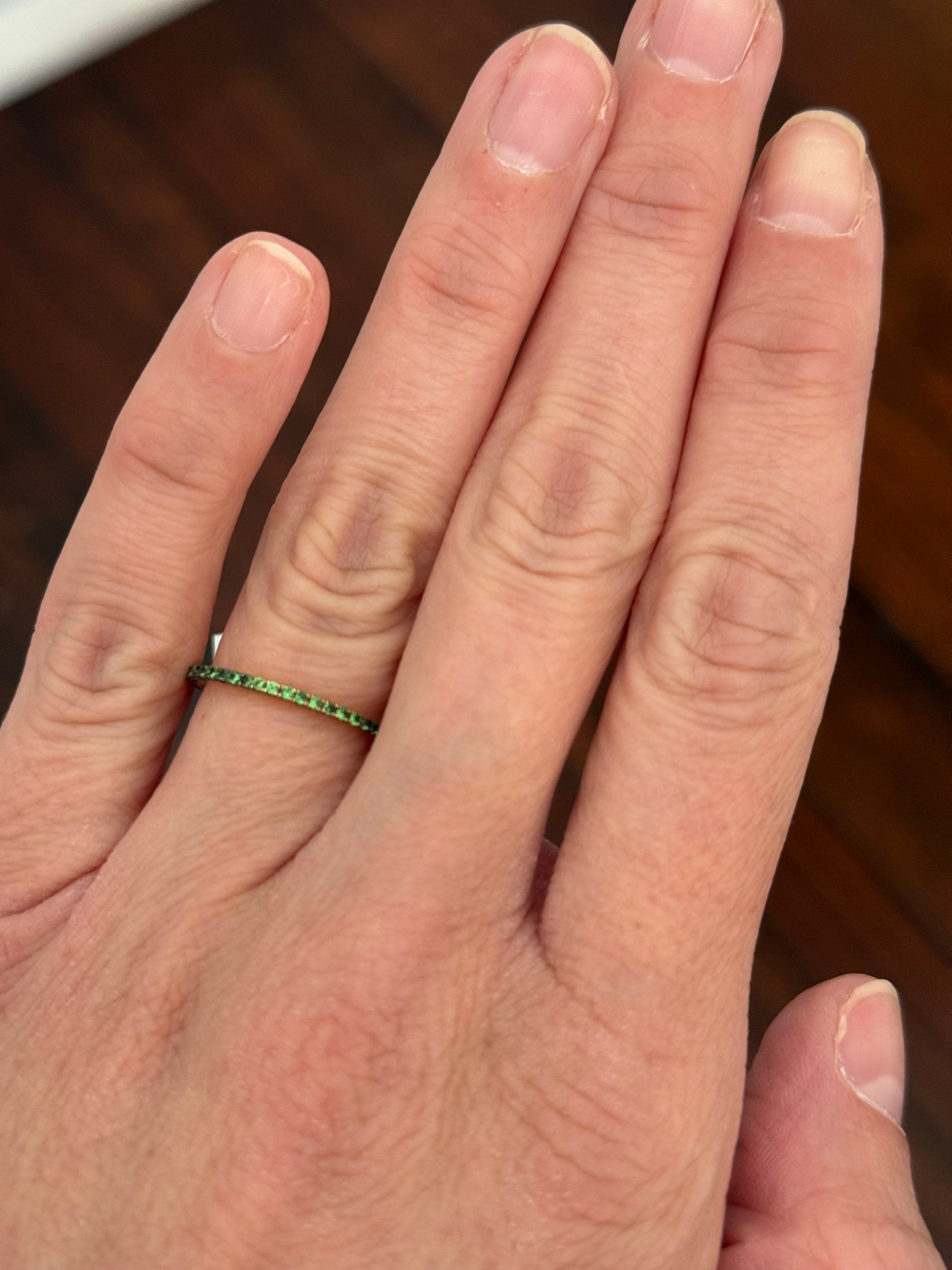 Yellow gold tsavorite eternity band