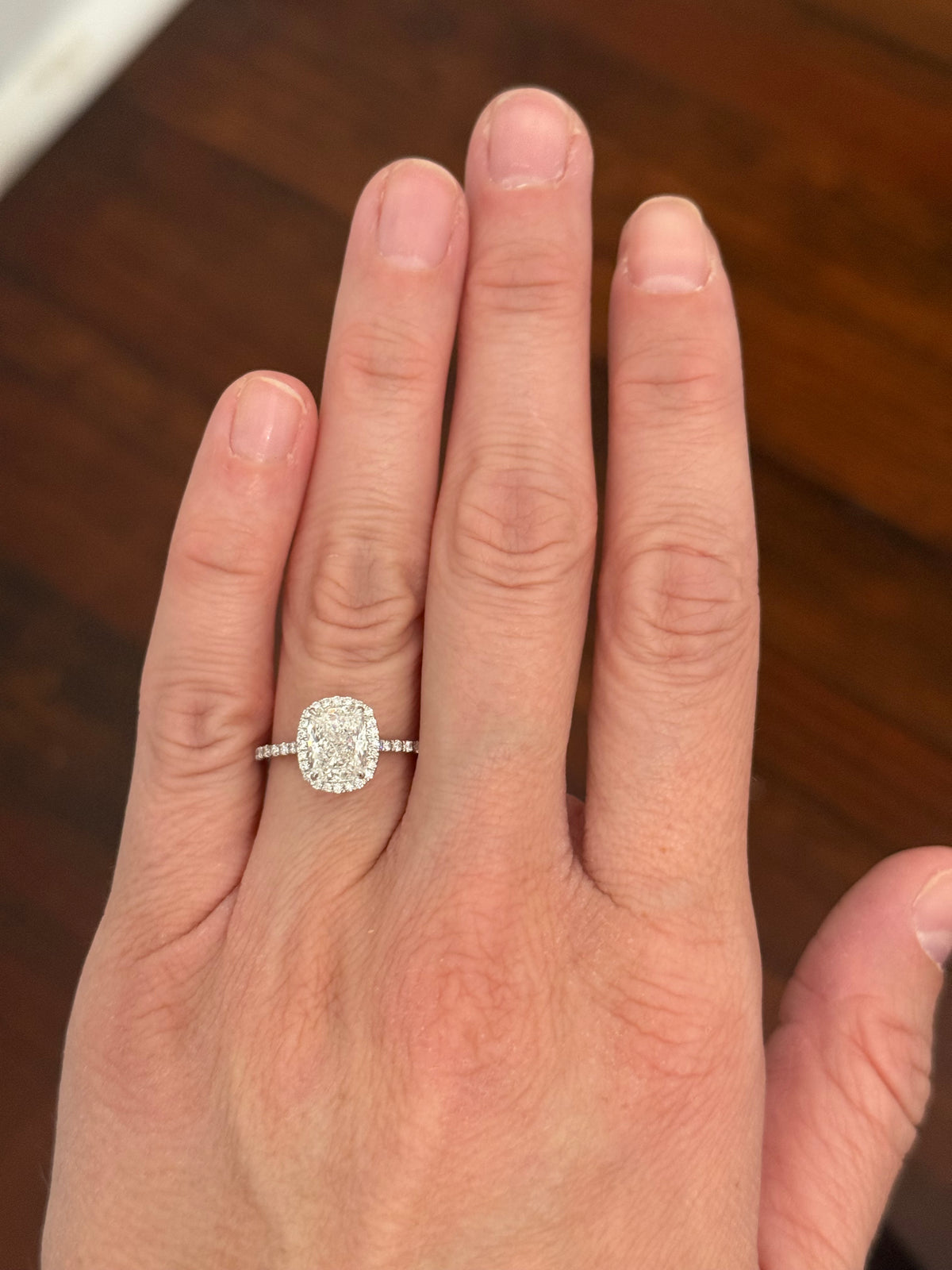 IGI certified cushion cut lab diamond ring. Center stone is 2.09cts