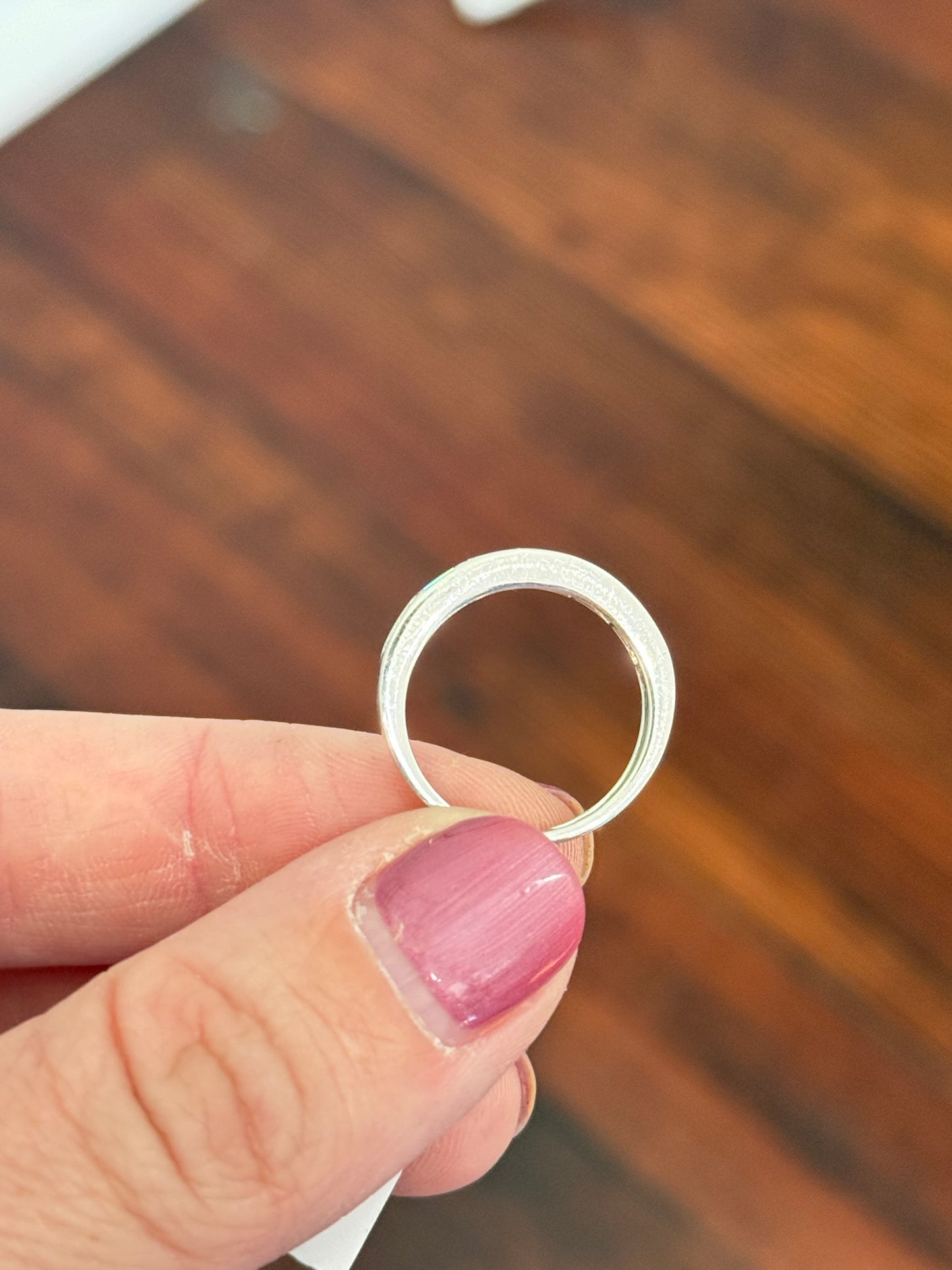 White gold east west set emerald cut lab diamond band