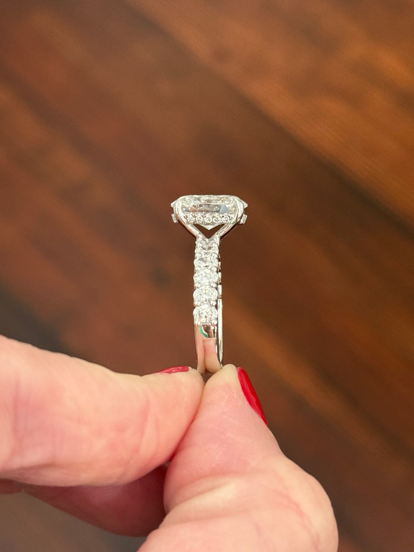 White gold oval lab diamond ring. Center stone is IGI certified and 3.07cts E VVS2