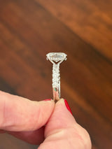 White gold oval lab diamond ring. Center stone is IGI certified and 3.07cts E VVS2