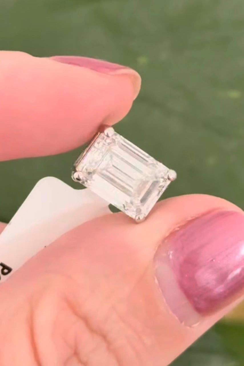 White gold IGI certified 4.1ct emerald cut lab diamond pendant. Can be worn east west and north south.