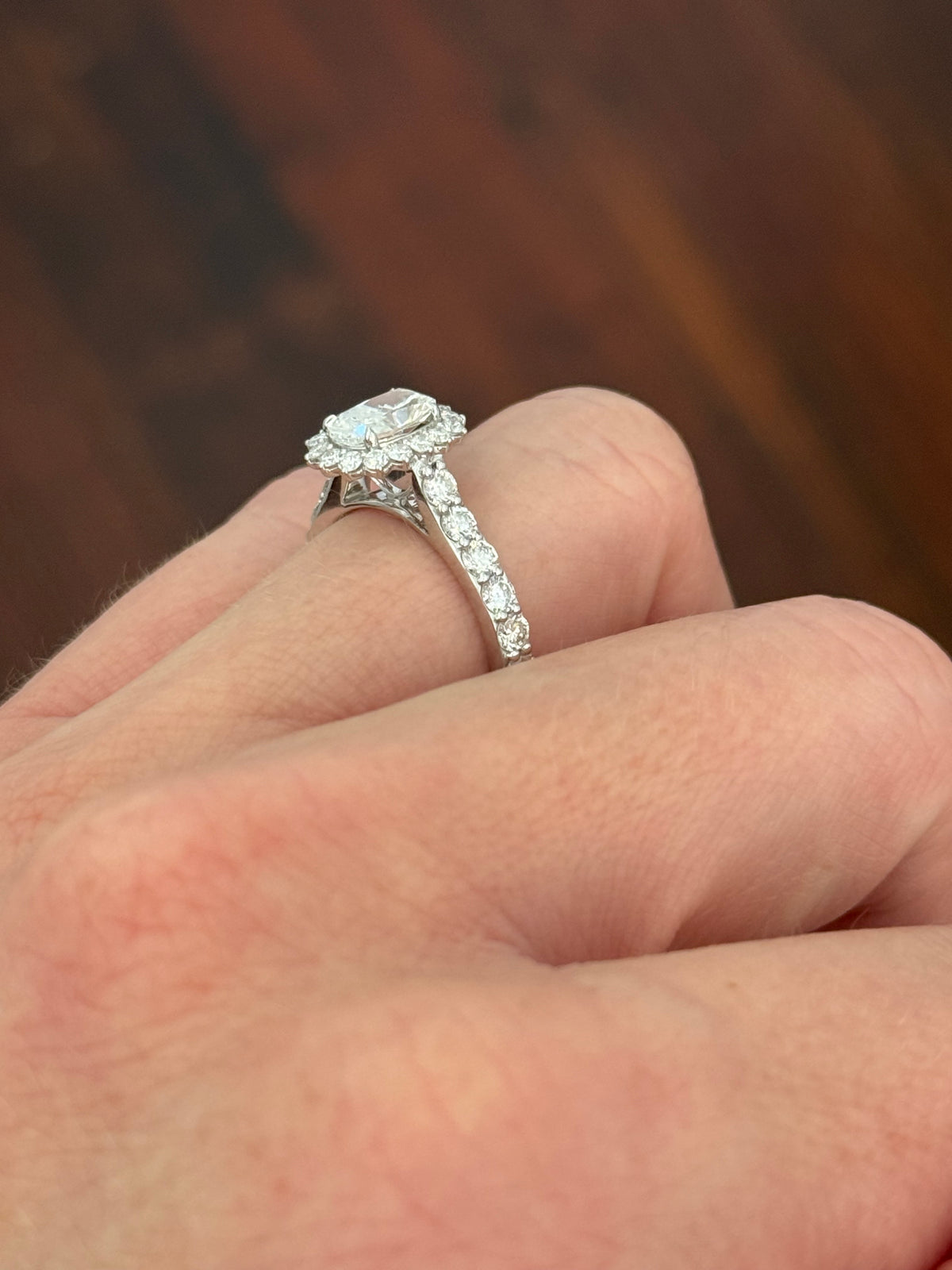 White gold cushion and round lab diamond ring. Center stone is 1ct and 7.1x4.8mm