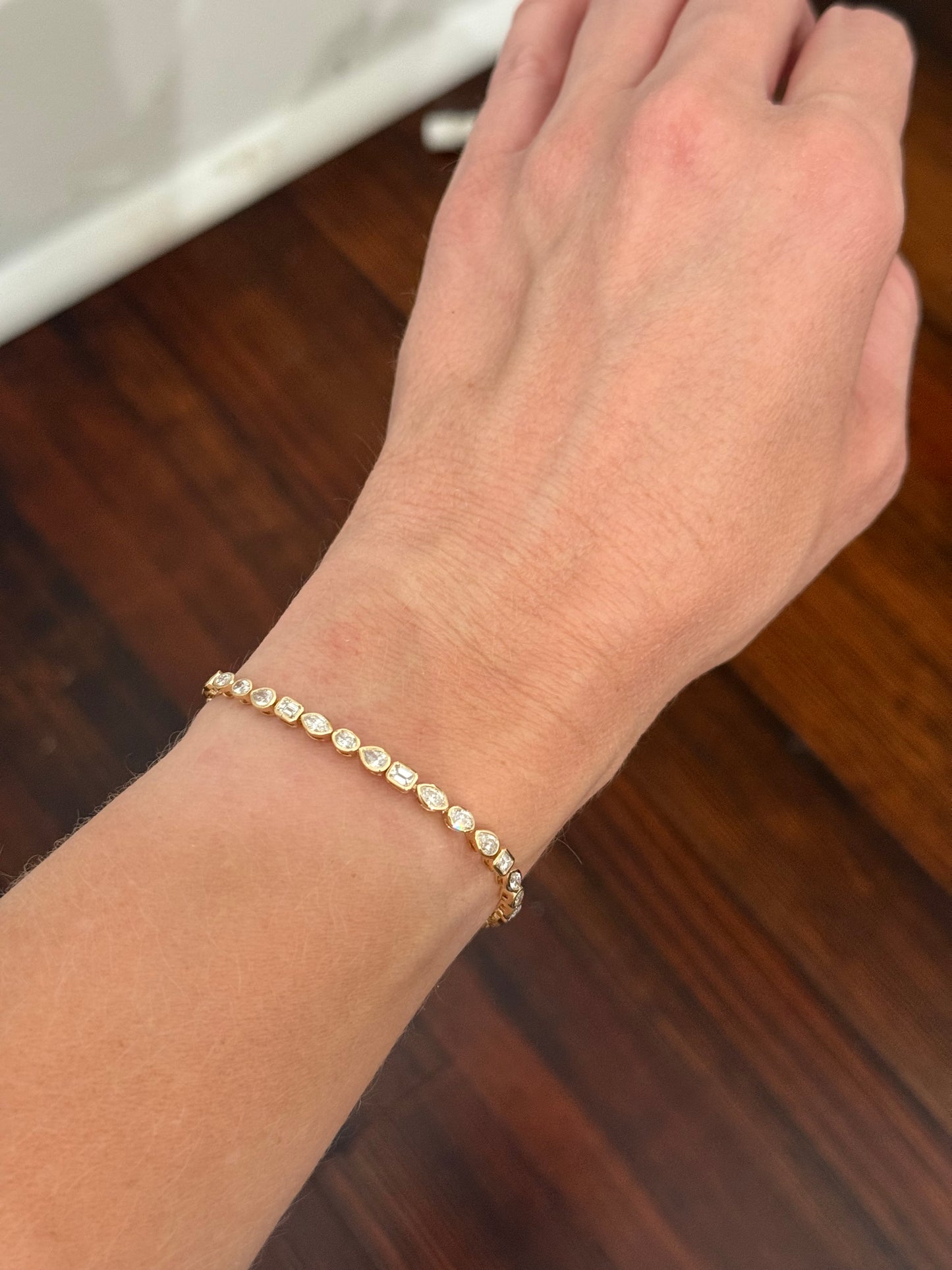 Yellow gold bezel set 4.62cts oval, marquise, pear shape and emerald cut natural diamond bracelet