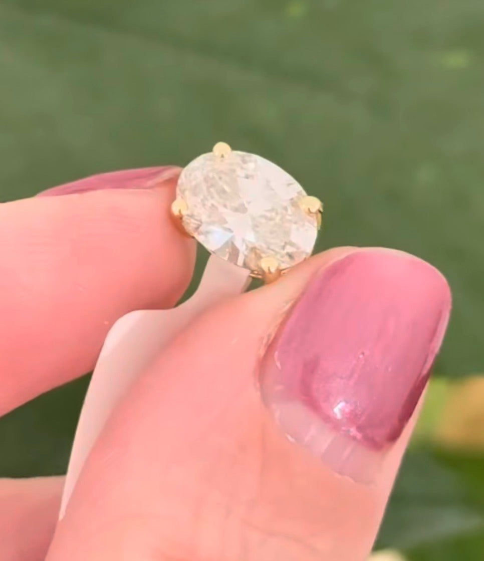 Yellow gold IGI certified 2.22ct oval lab diamond pendant. Can be worn east west and north south.