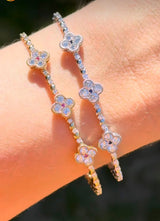 Lab diamond clover flex bracelets available in yellow and white gold