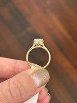IGI certified yellow gold cushion and round lab diamond ring. Center stone is 1.57cts