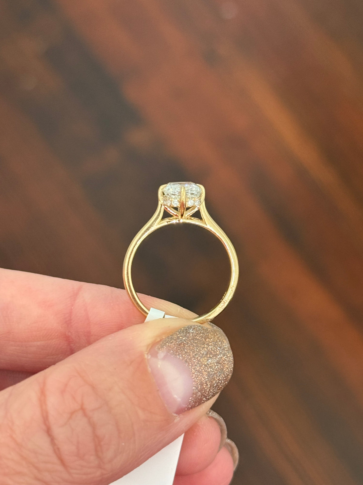 IGI certified yellow gold cushion and round lab diamond ring. Center stone is 1.57cts