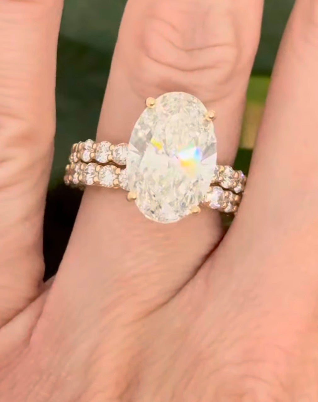 Yellow gold oval and round lab diamond ring and band set. Center stone is 6.58cts