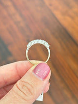 White gold emerald cut and oval lab diamond band