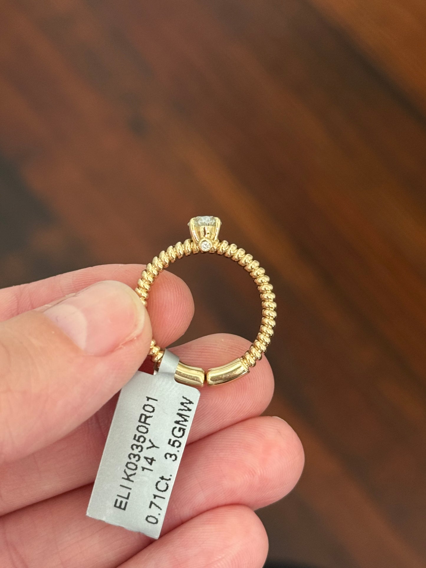 Yellow gold 0.71ct oval lab diamond flex ring