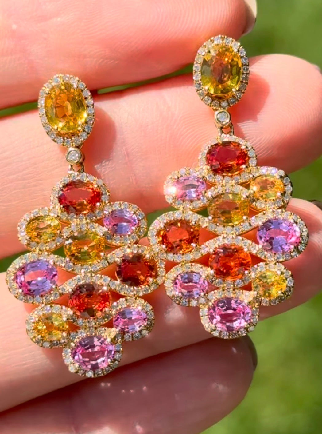 Yellow gold multi color oval sapphires and diamond dangle earrings