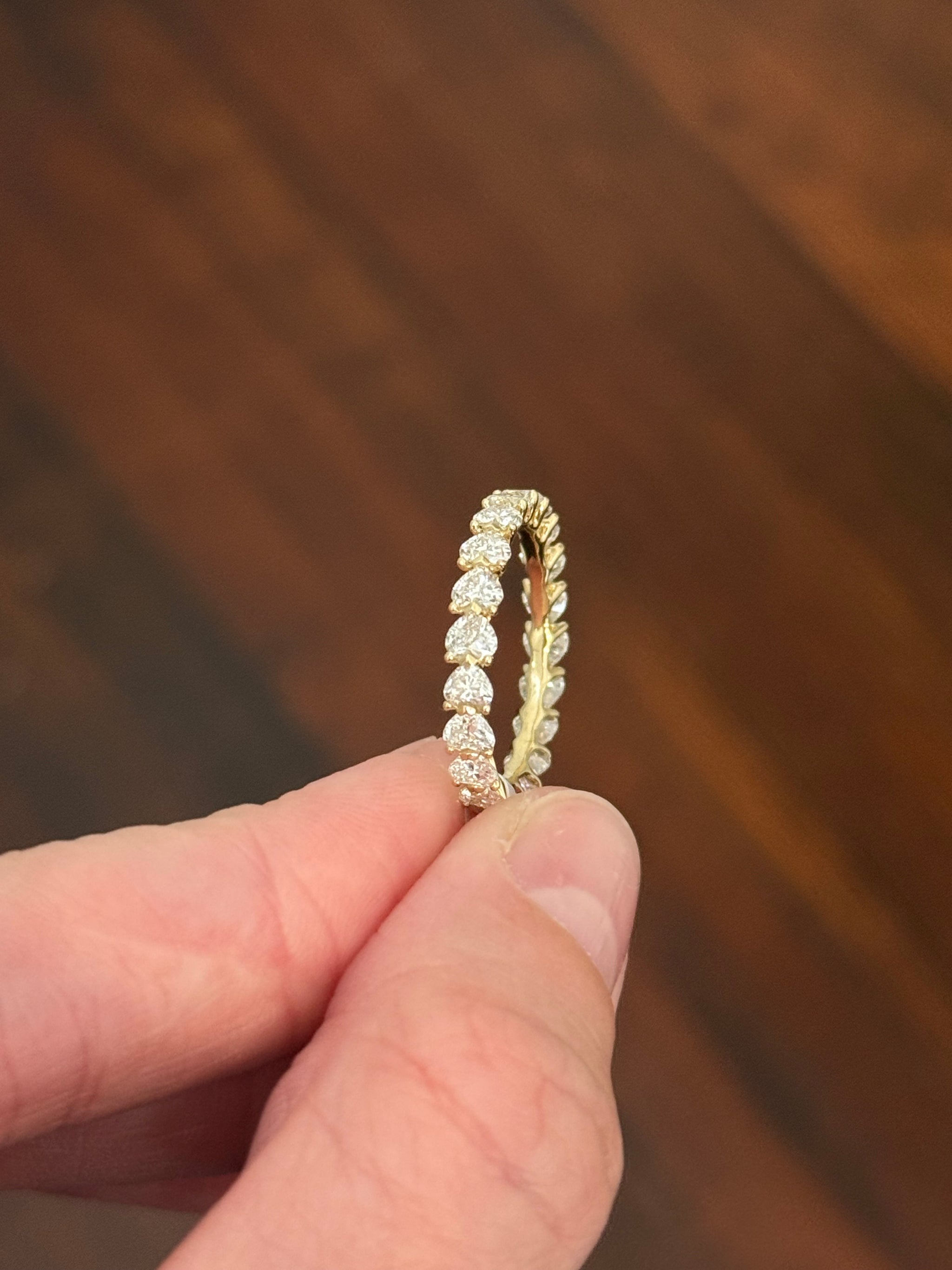 Yellow gold 2.33ct heart shaped lab diamond eternity band