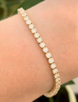 Yellow gold 4 prong 6.51ct natural diamond tennis bracelet