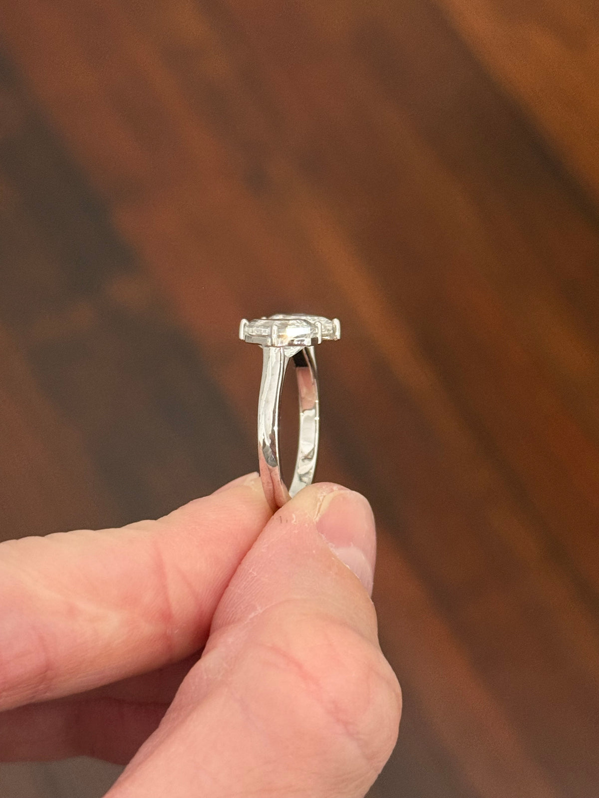 White gold 4.38ct step cut pear lab diamond bypass ring. Each measures 12.78x6.10mm