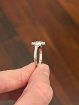 White gold 4.38ct step cut pear lab diamond bypass ring. Each measures 12.78x6.10mm