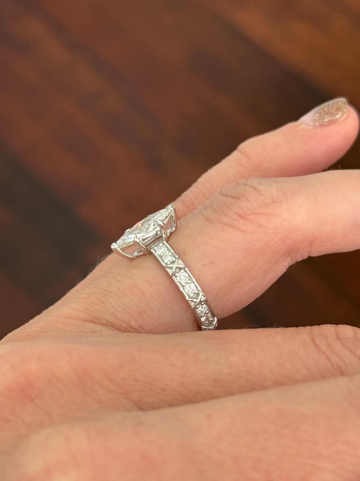 White gold marquise and round lab diamond ring. Center stone is 1ct and approximately 12x4.6mm