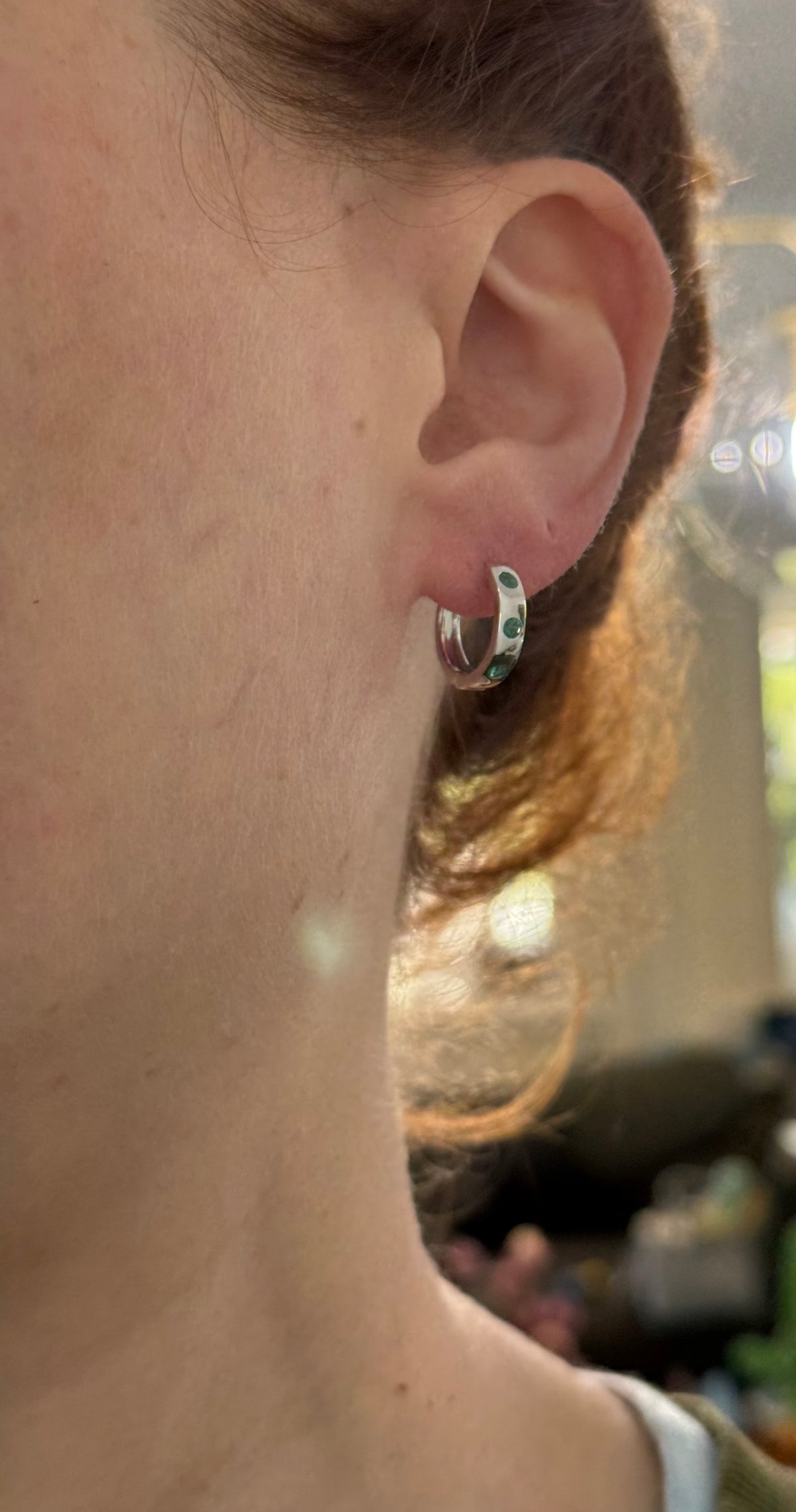 14.3mm hoop earrings available in yellow gold with rubies and white gold with emeralds
