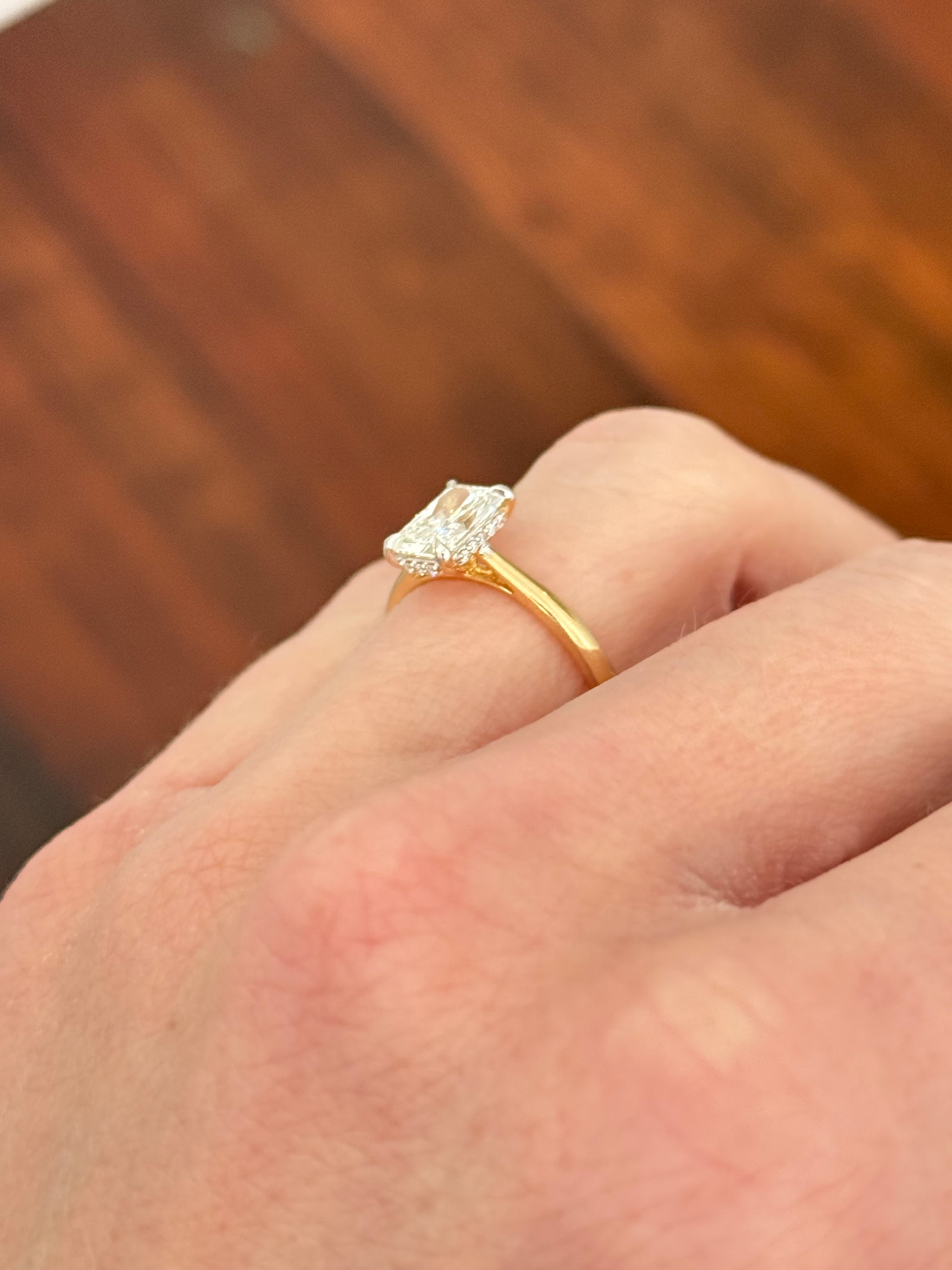 Yellow gold with white gold prongs radiant lab diamond ring