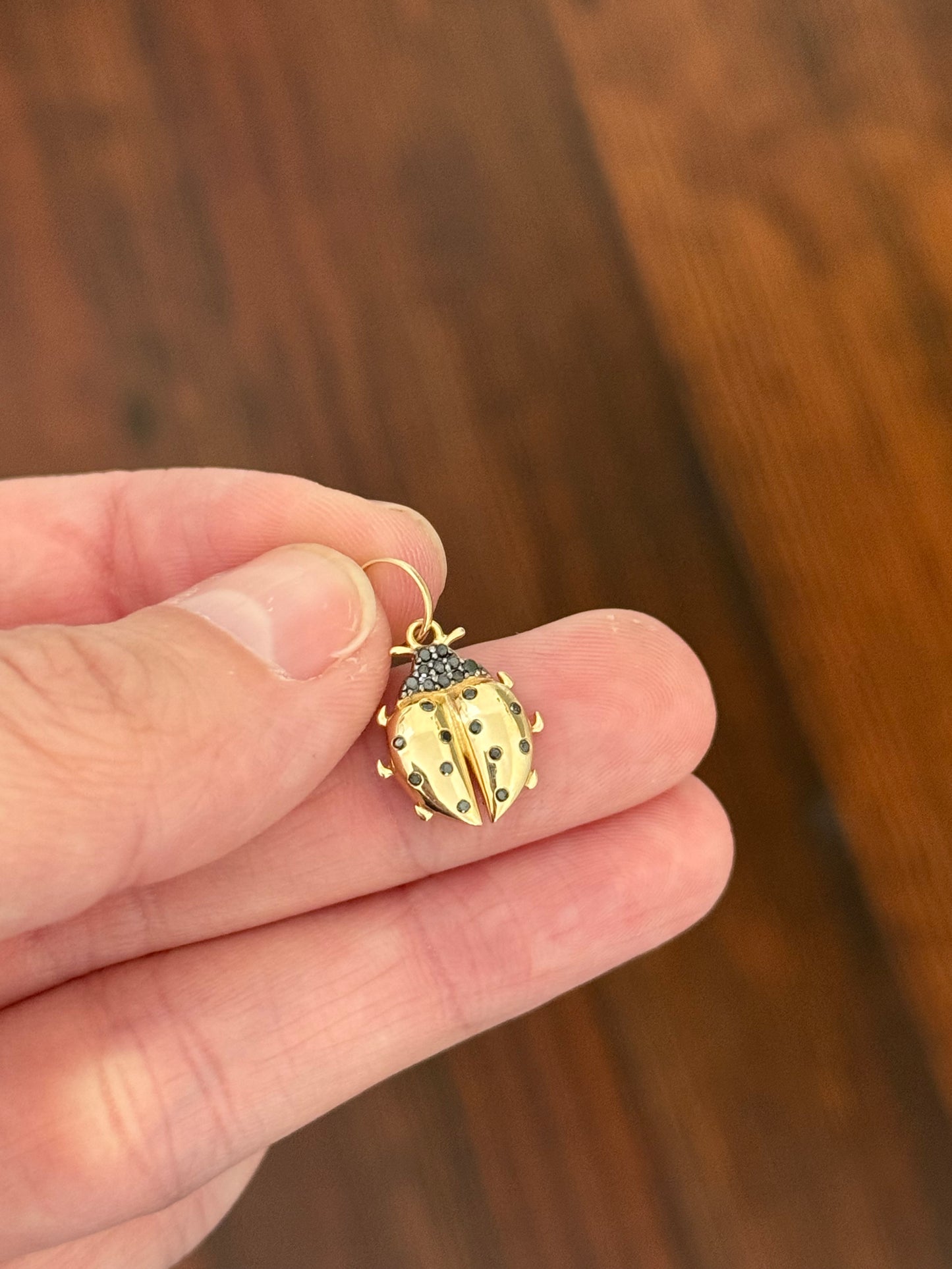 Yellow gold natural black diamond ladybug pendant