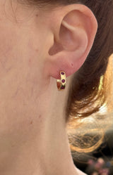 14.3mm hoop earrings available in yellow gold with rubies and white gold with emeralds