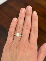Yellow gold radiant and round lab diamond ring