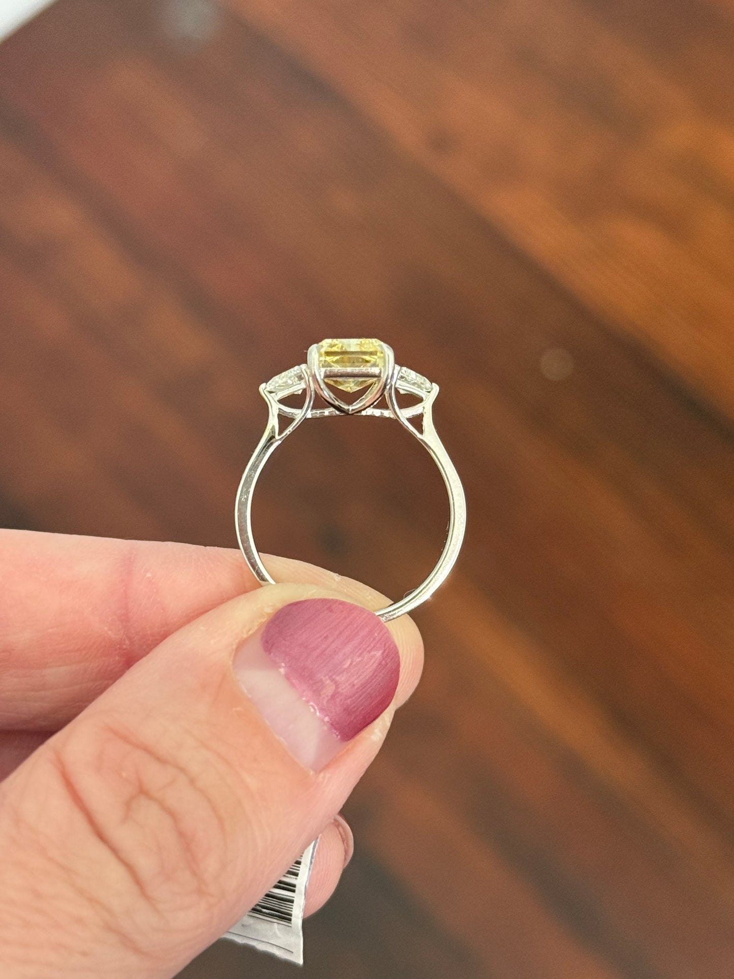 White gold radiant yellow lab diamond and trillion cut white lab diamond ring