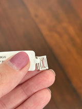 White gold IGI certified 4.1ct emerald cut lab diamond pendant. Can be worn east west and north south.