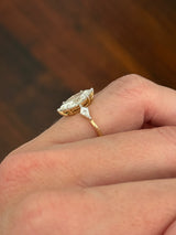 Yellow gold marquise and kite lab diamond ring. Prongs are white gold.