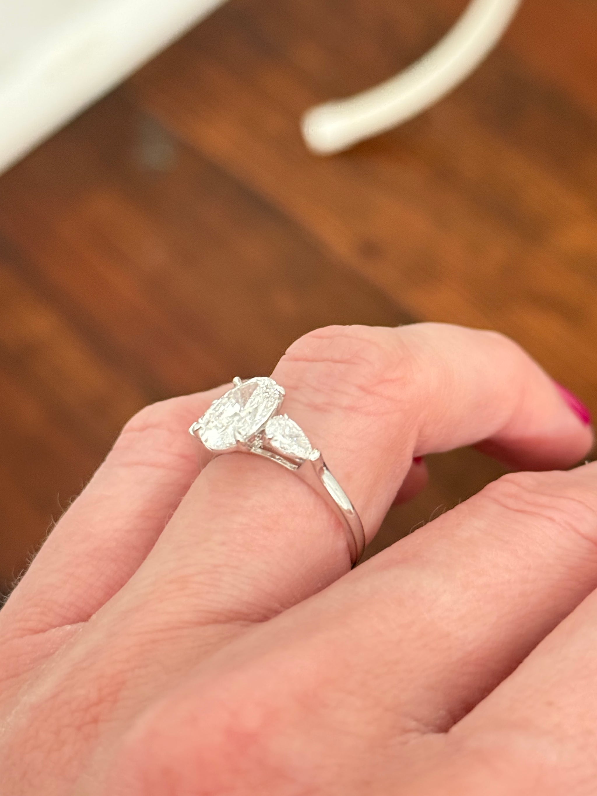 White gold IGI certified 2ct oval and pear shape lab diamond ring