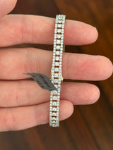 Yellow gold 5.56ct lab diamond bracelet. Prongs are white gold.