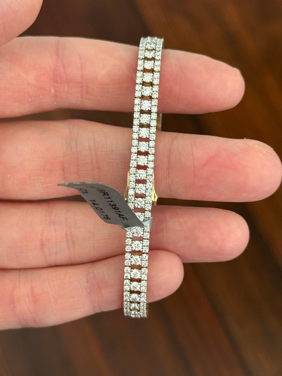 Yellow gold 5.56ct lab diamond bracelet. Prongs are white gold.